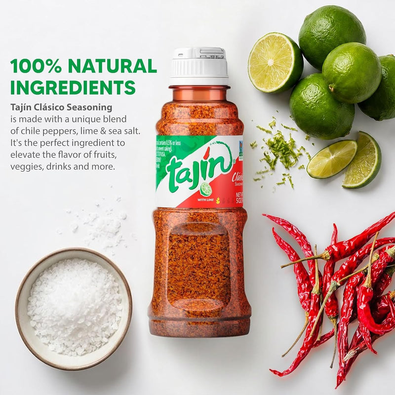 Tajín Clásico seasoning shaker with fresh limes, dried chillies and sea salt